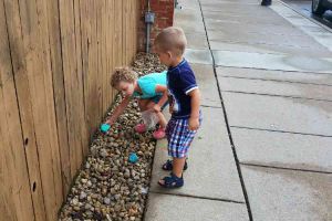 Blissfield Michigan Children Placing Painted Rocks