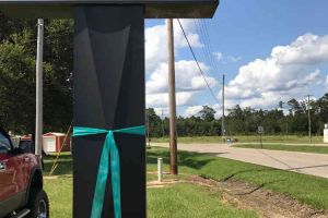 Pass Christian Mississippi Business Sign Teal Ribbon