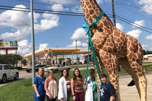 Pass Christian Mississippi Giraffe Statue Ribbon Group Photo
