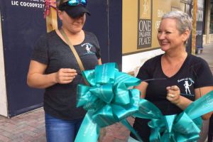 Pensacola FL Women Holding Ribbons